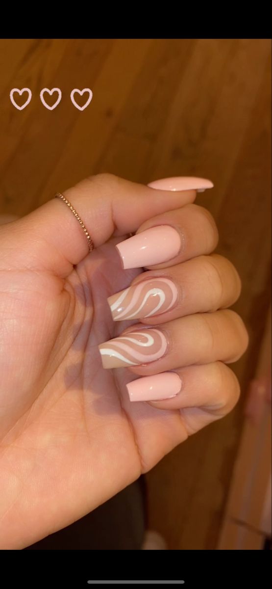 Chic Soft Pink Nail Design with Glossy Finish and Delicate White Swirls