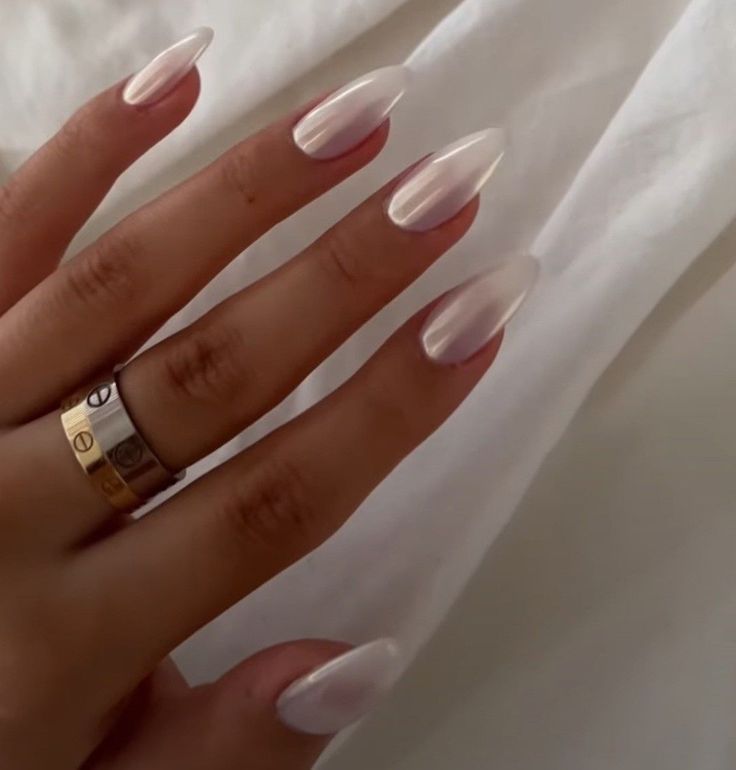 Chic Ombre Long Nails with Glossy Finish and Minimalist Rings for a Sophisticated Look