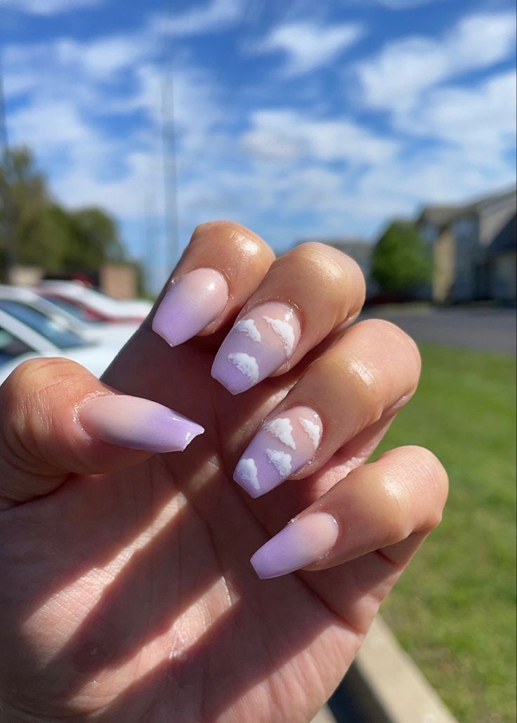 Whimsical Pastel Nail Design with Soft Lavender Gradient and Fluffy Cloud Accents.