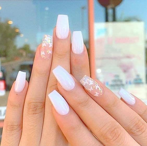 Sophisticated White Nail Design with Glossy Finishes and Iridescent Accents.