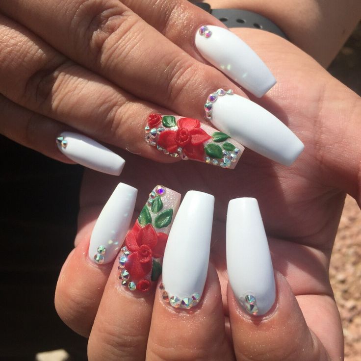 Chic Floral Elegance: White Nails with Red Roses, Green Leaves, and Glamorous Rhinestone Accents.