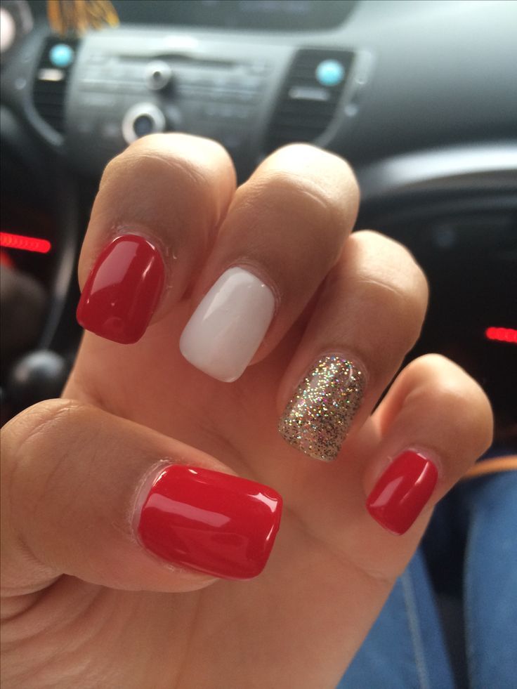 Vibrant Red, Elegant White, and Sparkling Gold Nail Design for a Stylish Statement.