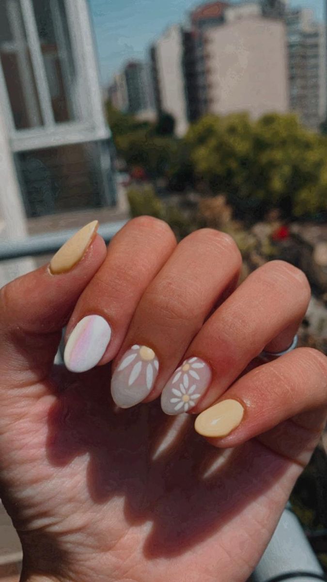 Charming Pastel Floral Nail Design for a Whimsical Summer Vibe.