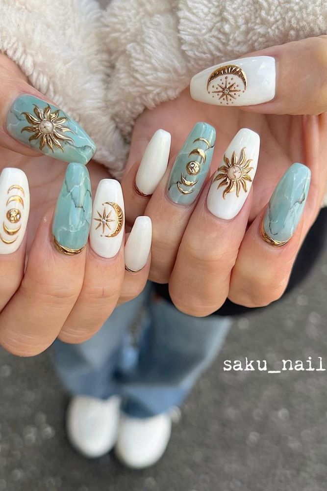 Elegant Turquoise and White Nail Design with Glamorous Gold Accents and Asymmetrical Modern Aesthetic