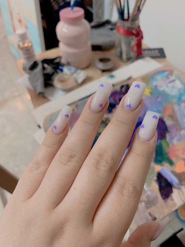 Charming Pastel Square Nail Design with Purple Heart Accents and Soft Gradient Effect