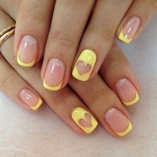 Whimsical Yellow Nail Design: Playful Tips and Heart Accents for a Cheerful Summer Vibe