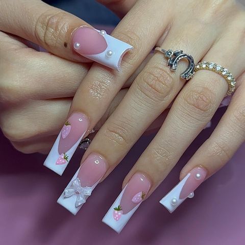 Charming Pastel Pink Nail Design with Strawberry, Pearl Accents, and Whimsical Bows.