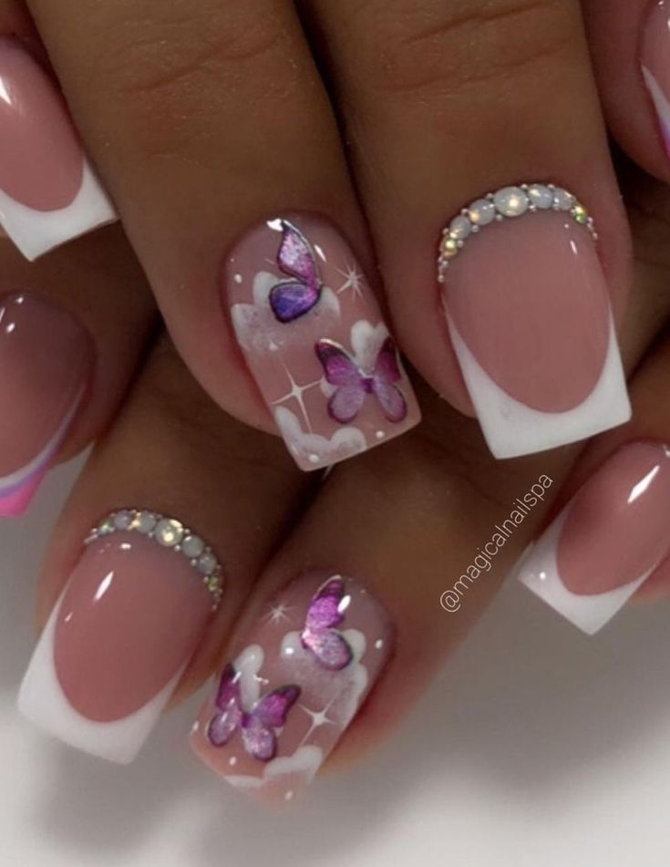 Charming Elegant Nail Design with Soft Nude French Tips and Whimsical Butterfly Accents.