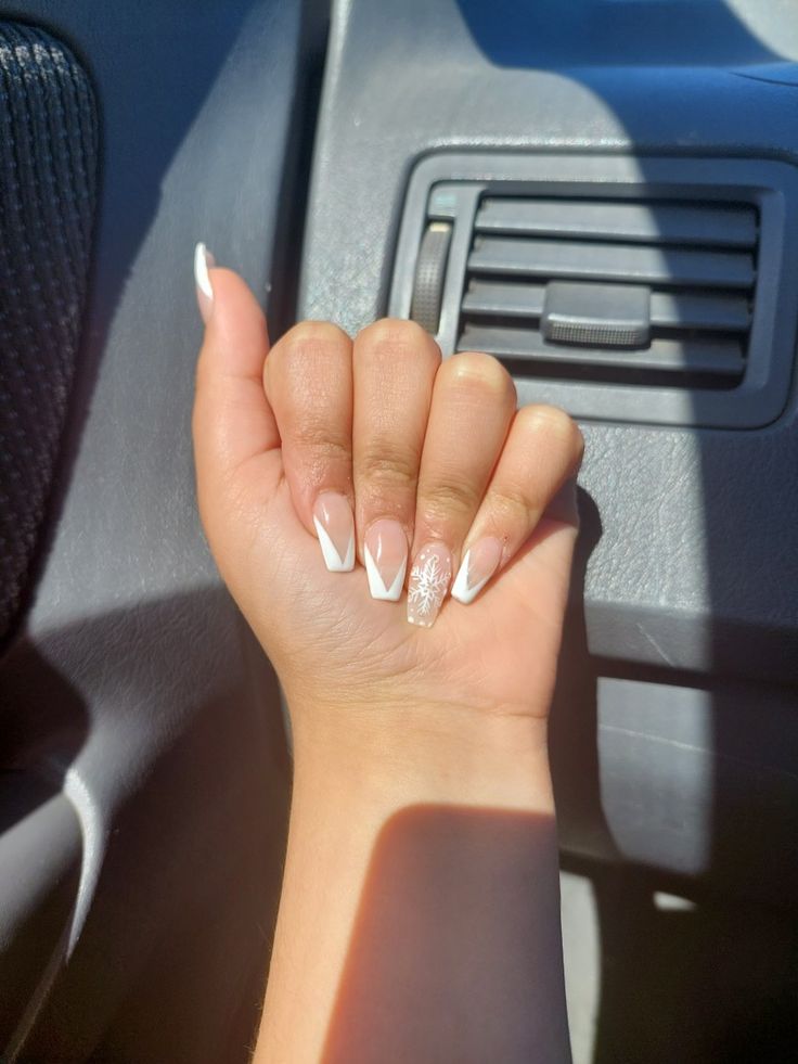 Chic Almond-Shaped French Manicure with Sparkling Glitter Accent.