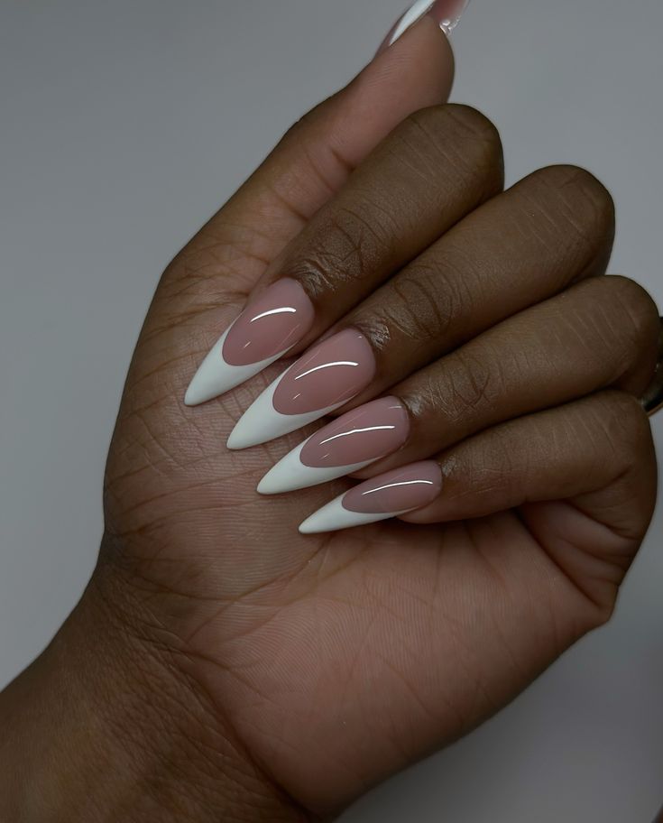 Chic Almond-Shaped Nails: Sophisticated Nude and White French Manicure Design