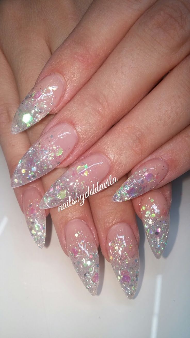 Whimsical Glamour: Iridescent Glitter & Elongated Nail Design