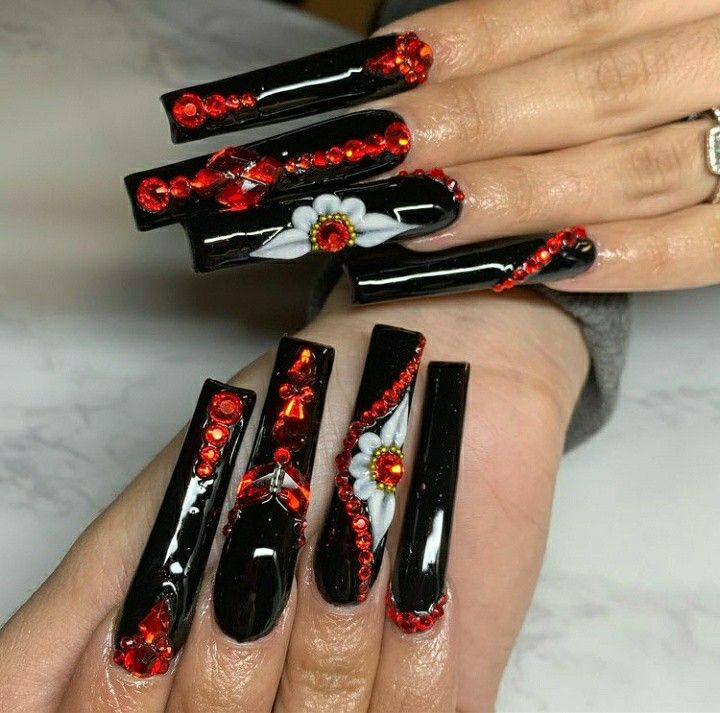 Bold Black Nails with Red Gems and Elegant Floral Accents