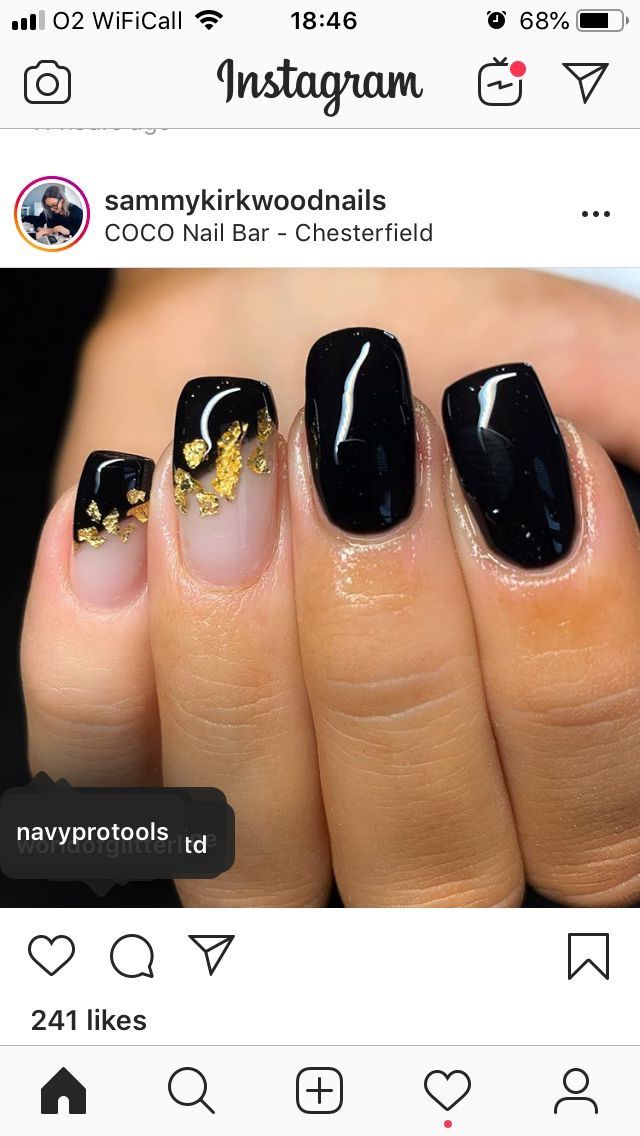 Elegant Nail Design with Glossy Black, Nude Shades, and Gold Foil Accents.