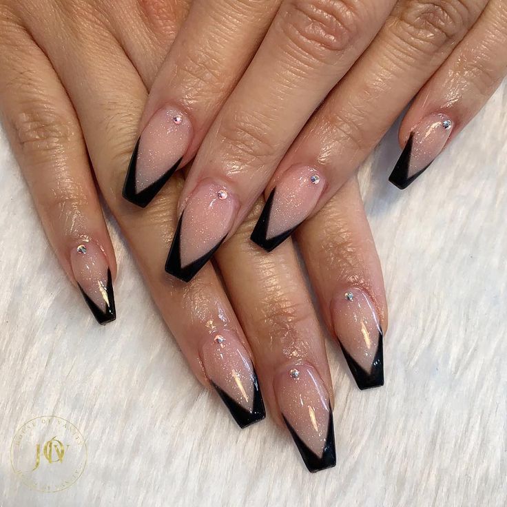 Chic Black French Tip Nails with Glossy Nude Base and Rhinestone Accents