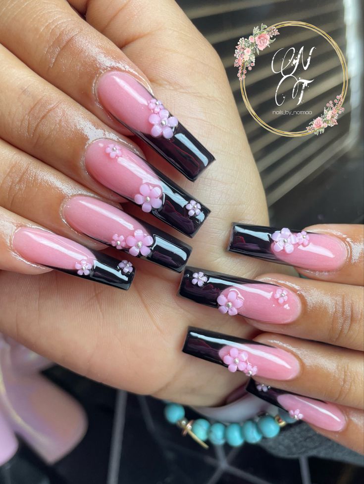 Elegant Long Black and Pink Floral-Inspired Nail Design