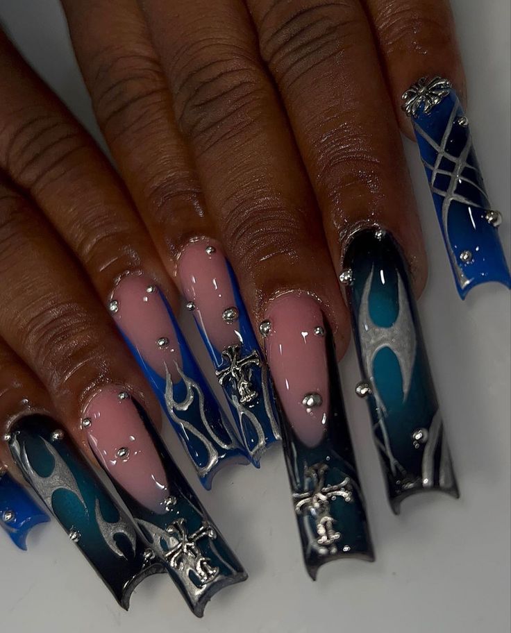 Bold and Intricate Nail Design with Gradient Blues, Glossy Black Tips, and Silver Accents.