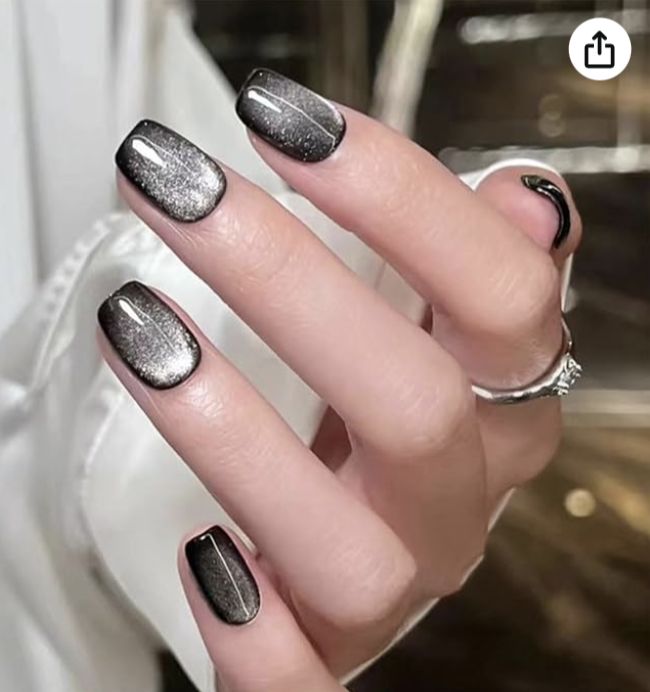 Striking Glossy Black and Silver Nail Design for Chic Sophistication.