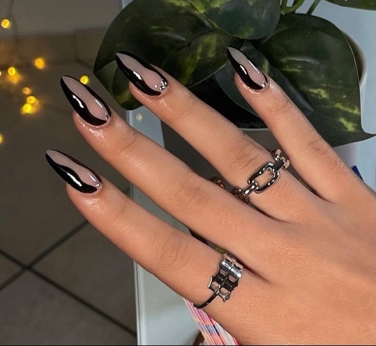 Chic Almond-Shaped Nails: Elegant Nude and Glossy Black Dual-Color Design