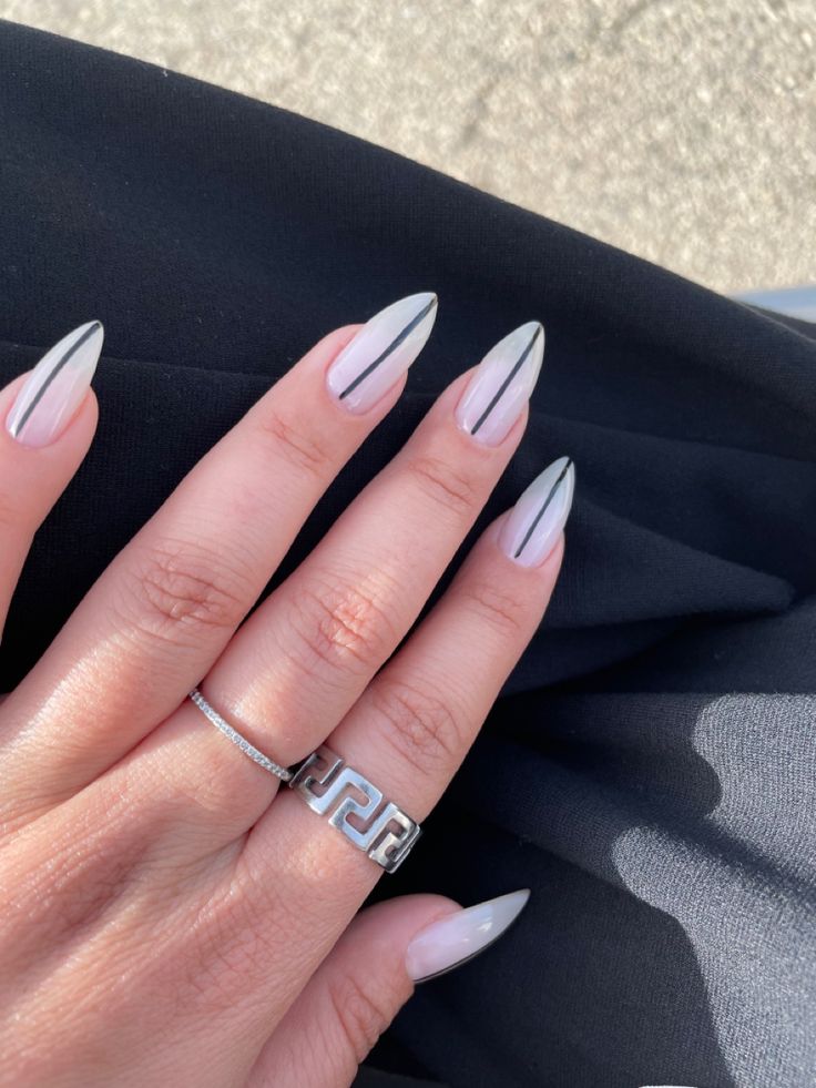 Chic Almond-Shaped Nails with Stunning Chrome Tips for a Sophisticated Look.