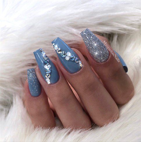 Glamorous Elegant Blue Nail Design with Intricate Embellishments and Sparkling Accents