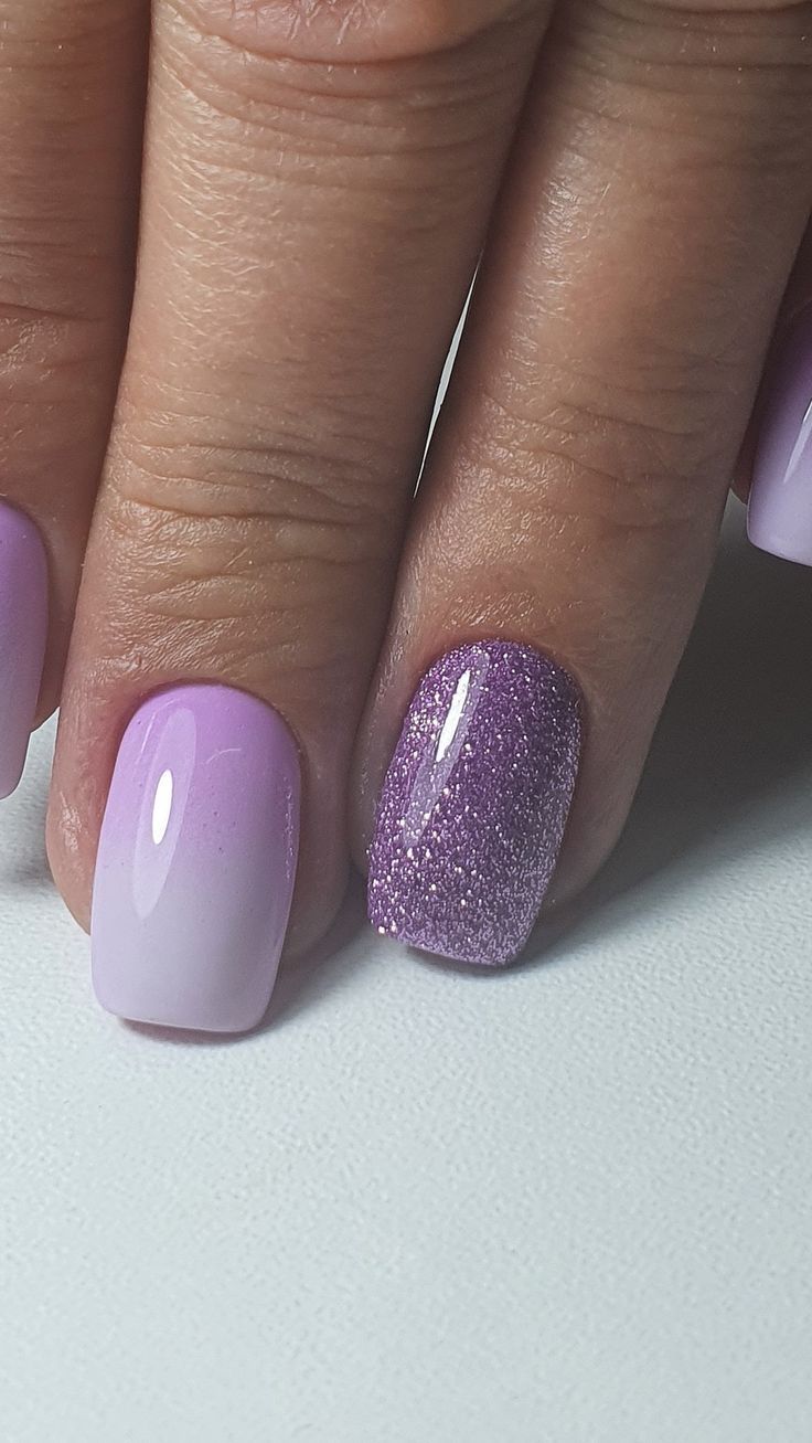 Chic Purple Gradient Nail Design with Glamorous Glitter Accents