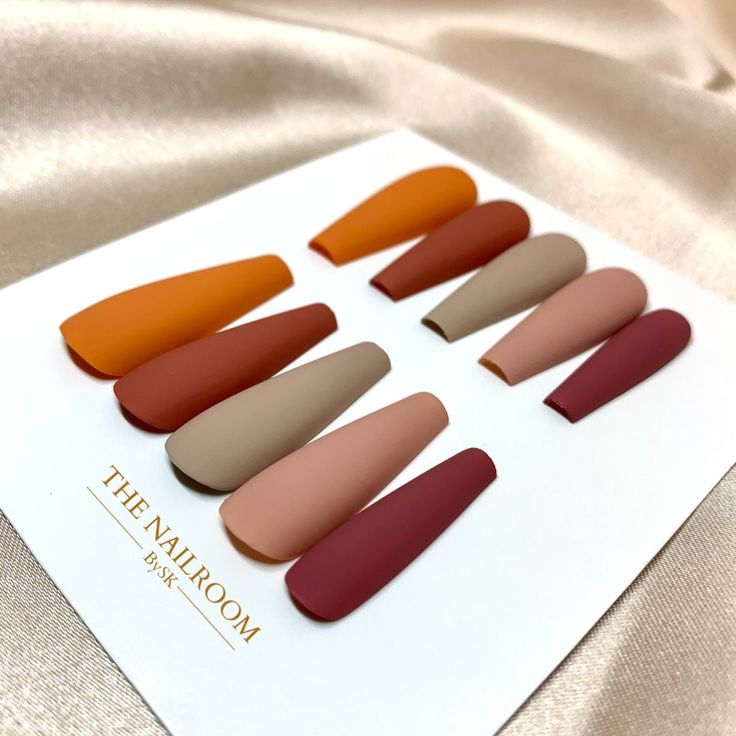 Elegant Matte Nail Designs in Warm Autumn Palette for Cozy Aesthetic