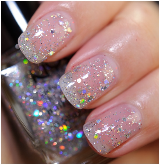 Elegant Sparkling Nail Design: Sheer Base with Holographic Glitter Overlay