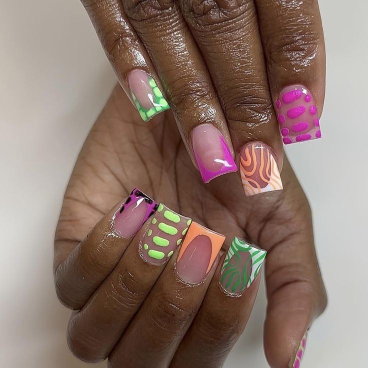 Vibrant Eclectic Nail Designs: Bold Patterns and Playful Colors for a Statement Look.