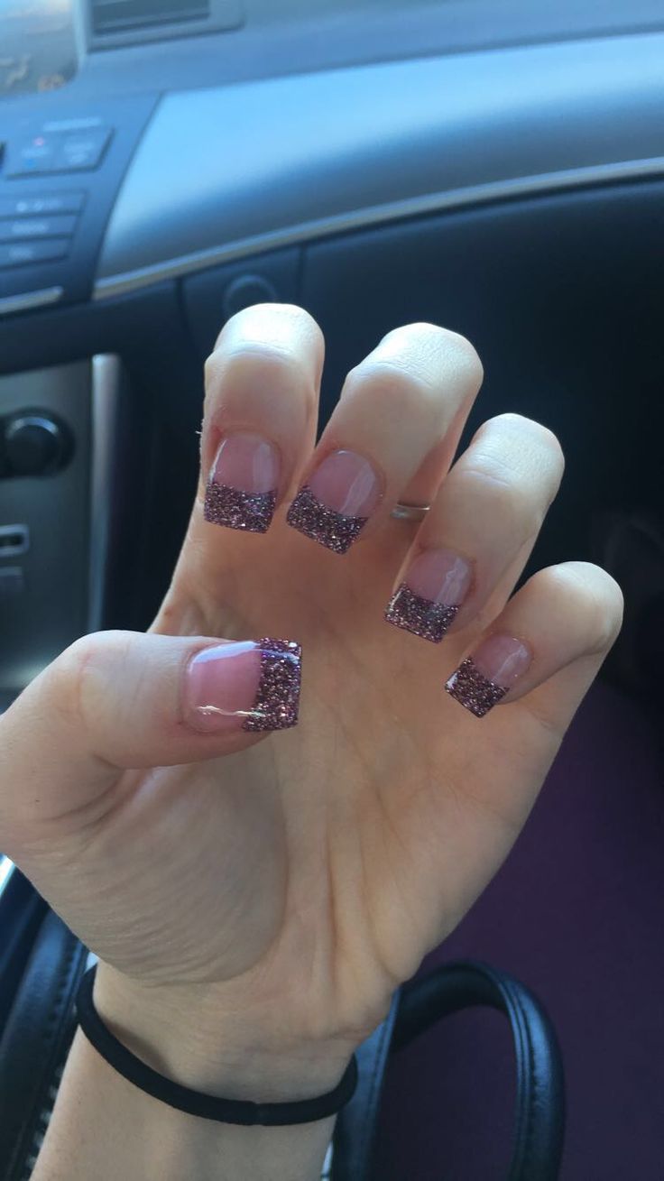 Chic Ombre Nail Design: Sparkling Transition from Soft Pink to Vibrant Purple.