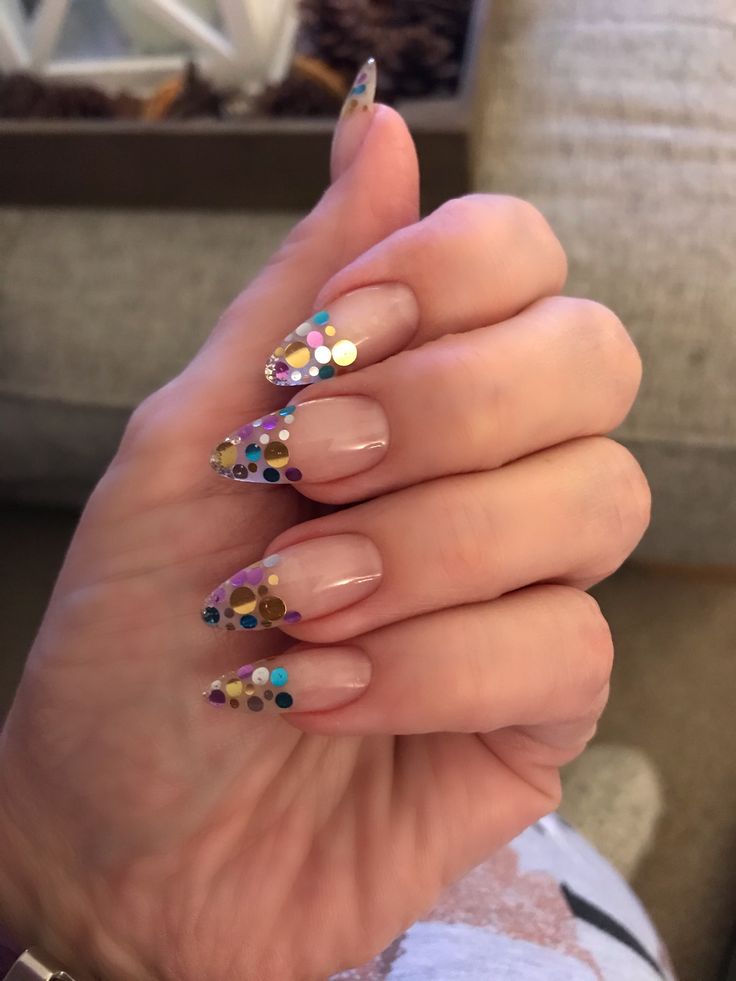 Playful Confetti-Dot Nail Design: A Fun Twist on Elegance.