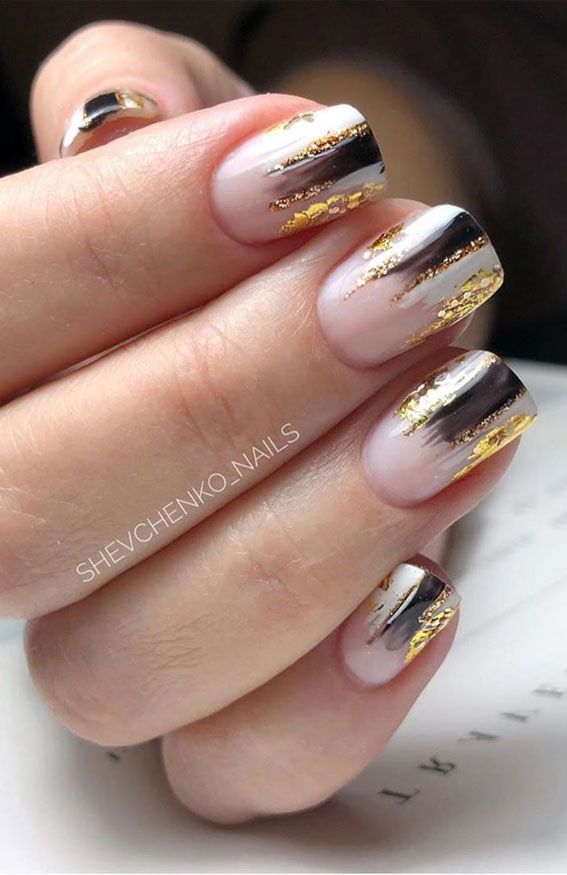 Chic Nail Design: Elegant Nude and Dark Color Blend with Gold Foil Accents