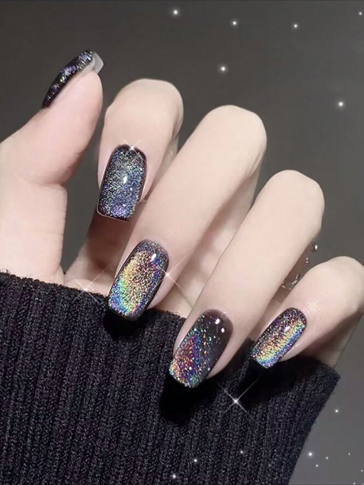 Captivating Sparkling Holographic Nail Design with Multi-Dimensional Color Shifts.