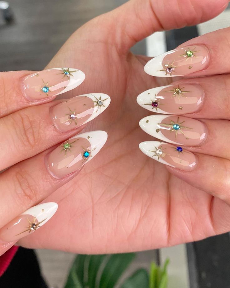 Elegant Chic Nail Design with Nude French Tips and Sparkling Star Embellishments