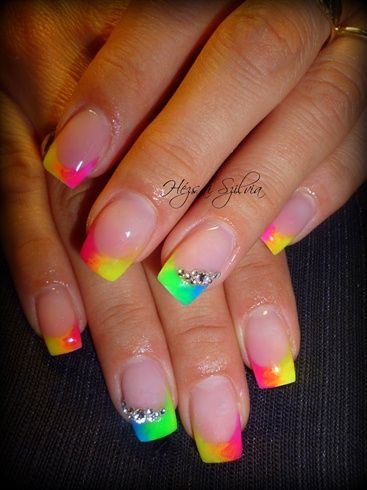 Vibrant Neon Ombre Nail Design with Rhinestones for a Trendy Look