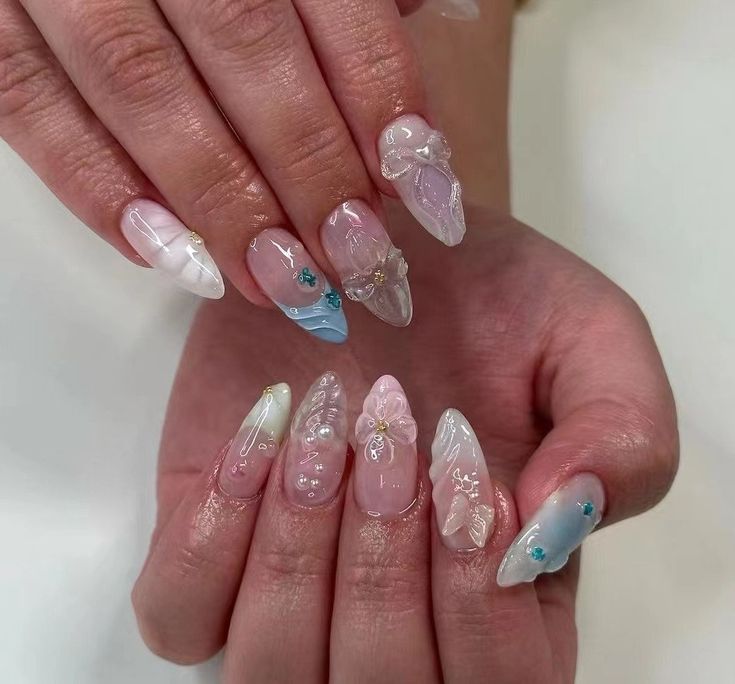 Whimsical Pastel Nail Art: A Playful Blend of Textures and Elegance.