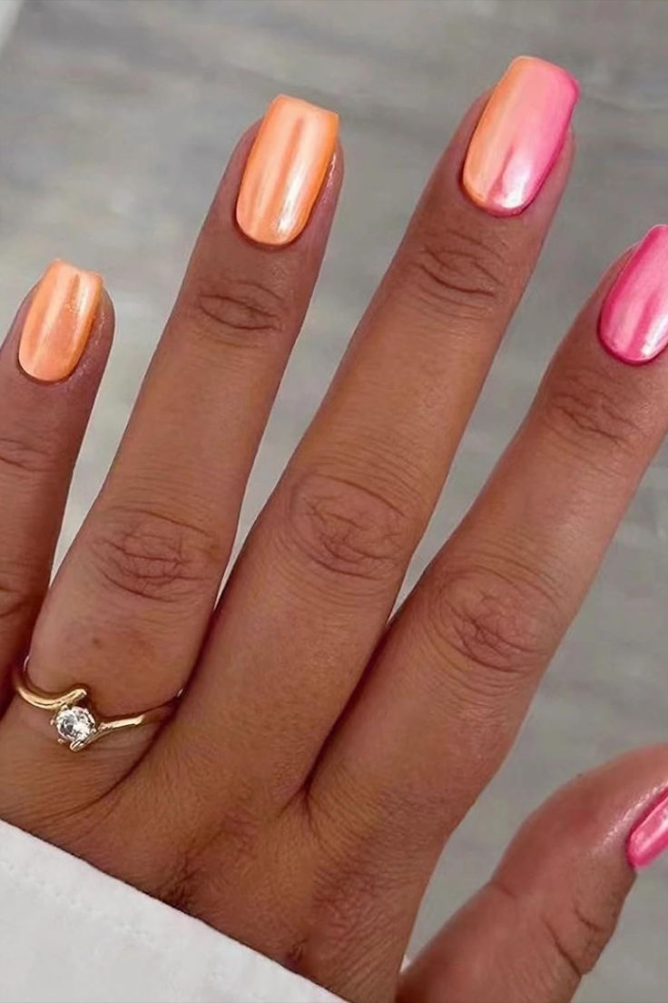 Vibrant Gradient Nail Design: Bold Orange to Glossy Pink for a Playful Summer Elegance.