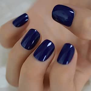 Elegant Deep Navy Nail Design: Chic, Glossy Finish for Any Occasion.