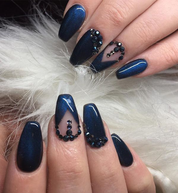 Sophisticated Navy Blue Nails with Glossy Finish and Glamorous Gemstone Designs.