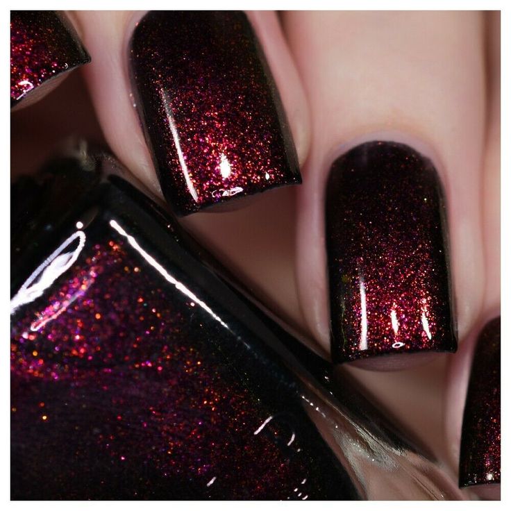 Elegant Shimmering Burgundy and Black Gradient Nail Design with Glitter for Glamorous Occasions.