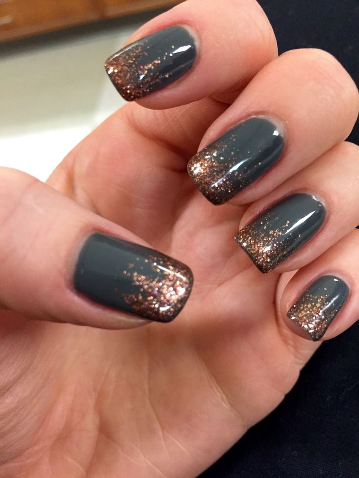 Chic Dark Gray and Sparkling Copper Ombre Nail Design: A Versatile Glamour Choice.