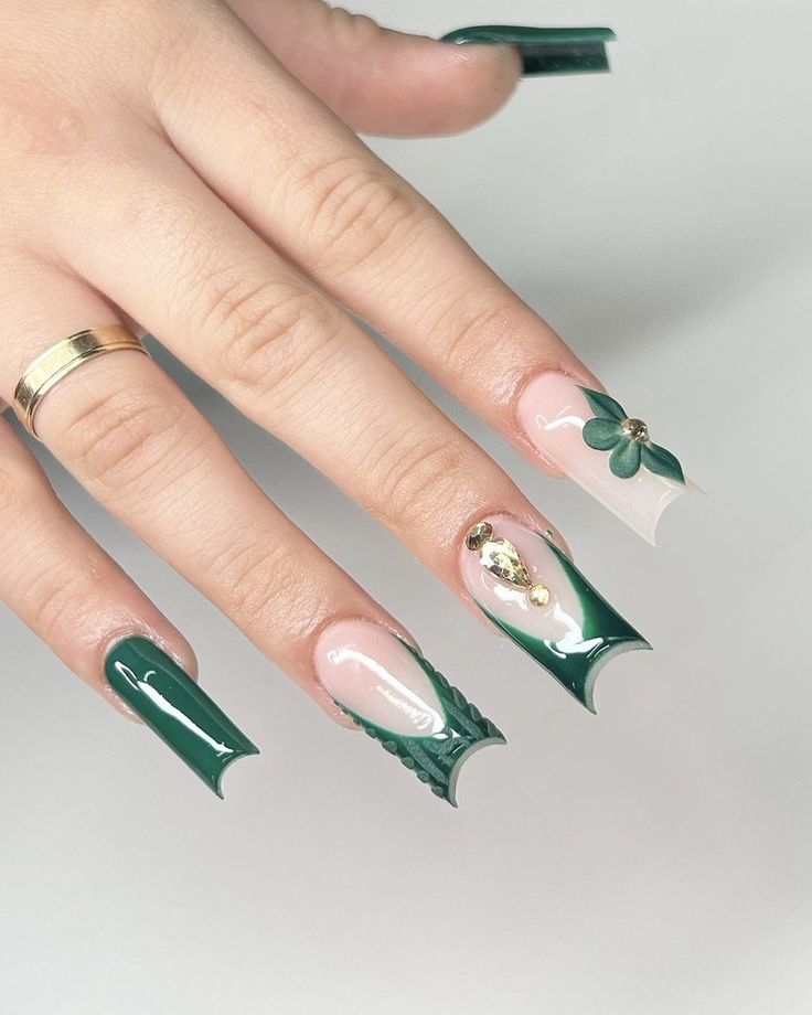 Striking Elegant Nail Design with Deep Green, Neutral Tones, and Intricate Floral Gold Accents