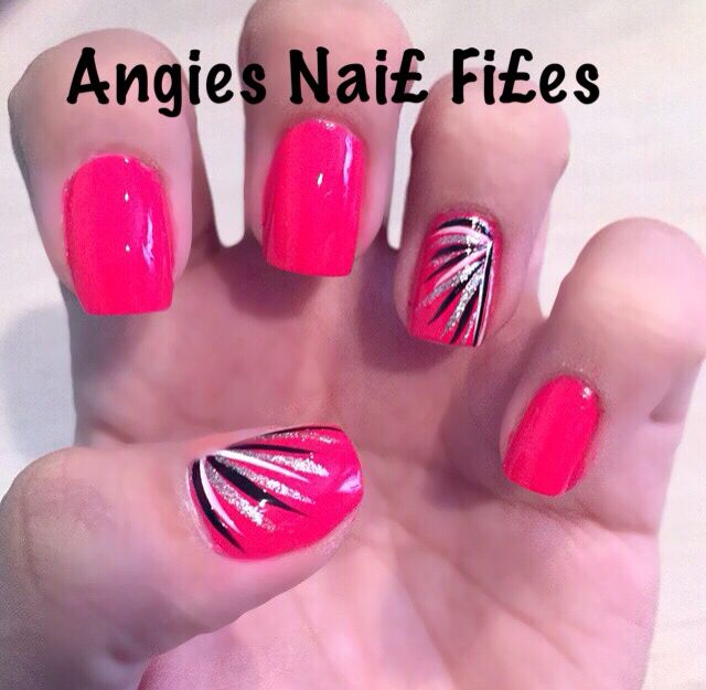 Bold Vibrant Pink Nail Design with Glossy Finish and Dynamic Black-Silver Detailing