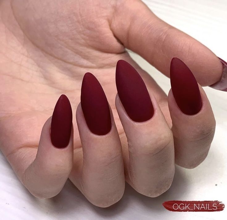 Striking Deep Burgundy Matte Elegant Almond-Shaped Nails for Glamorous Occasions.