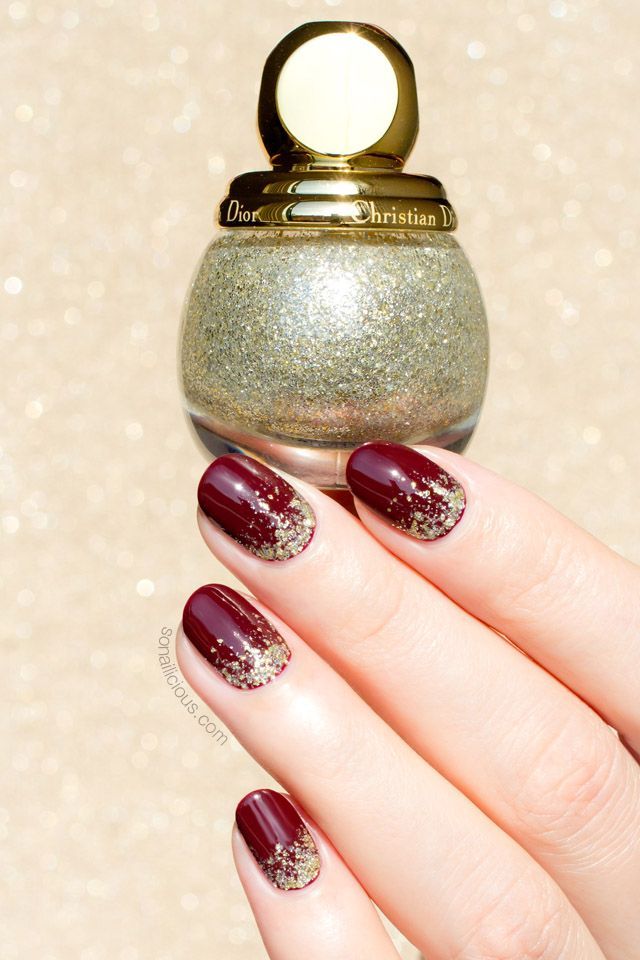 Chic Burgundy and Gold Gradient Nail Design for Special Occasions.