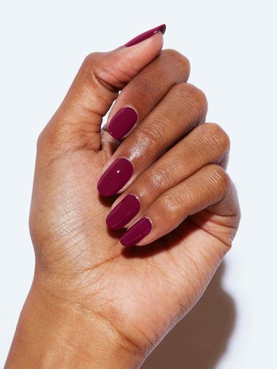 Sophisticated Burgundy Almond-Shaped Nails: A Timeless and Elegant Design for the Fashion-Forward.