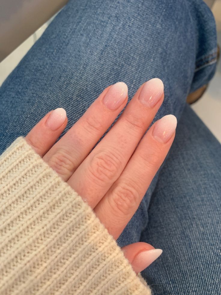 Chic Almond-Shaped Nail Design with Soft Gradient and Subtle White Tips