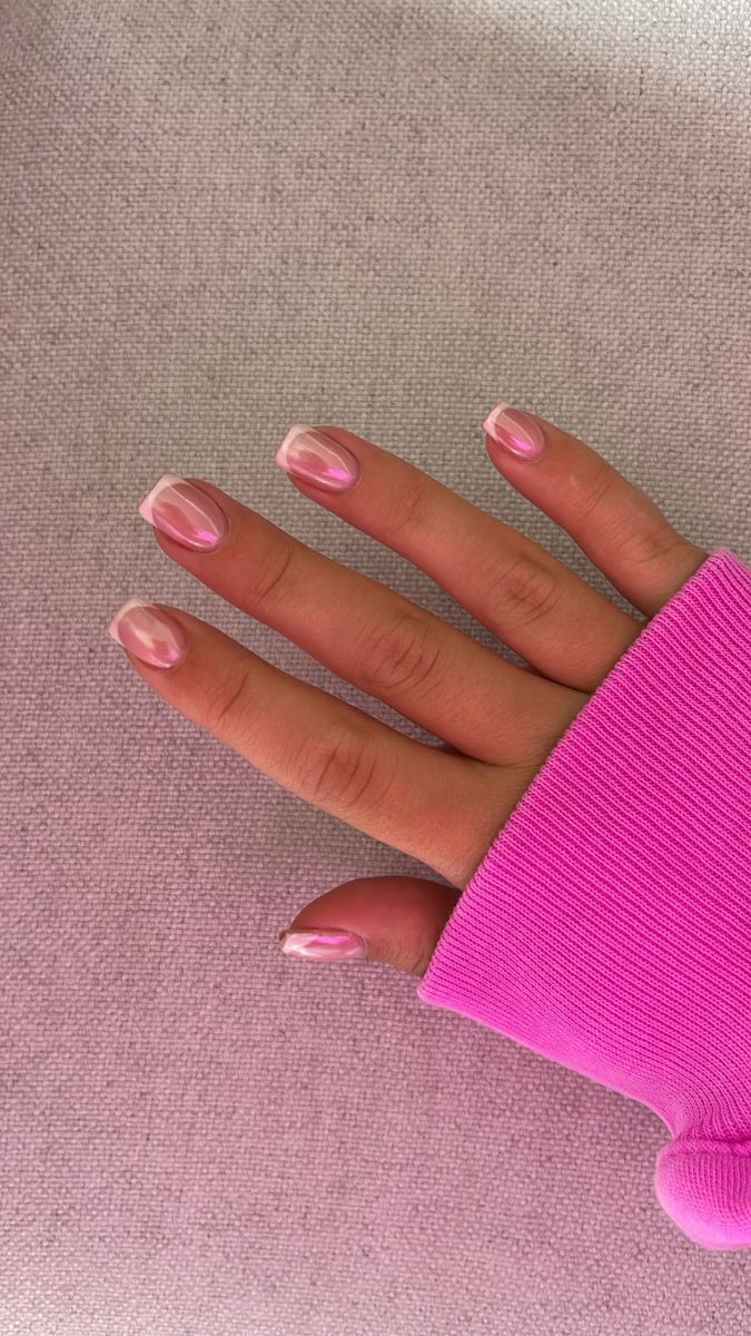 Stylish Relaxed Vibe: Elegant Soft Pink Ombre Nail Design with Glossy Finish and Oversized Sweater