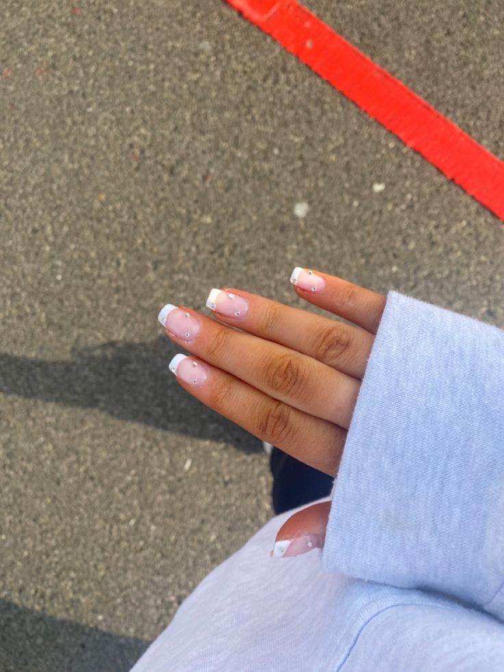 Timeless French Tip Manicure with Soft Pink Base and Sparkling White Tips