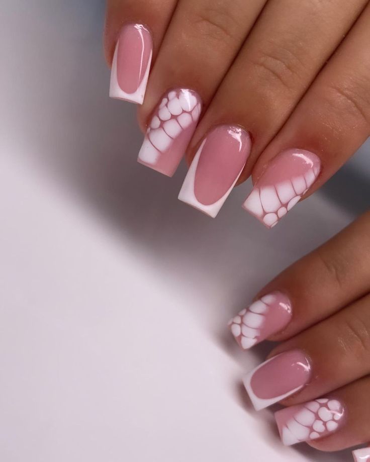 Chic Soft Pink and White Lace-Inspired Nail Design with Glossy Finishes.