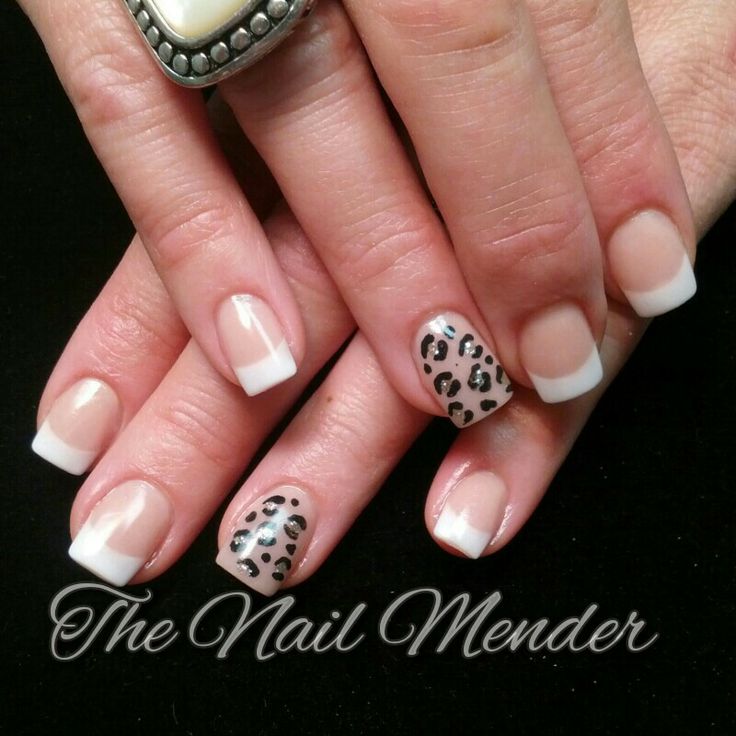 Chic Nude and White Manicure with Bold Leopard Print Accent